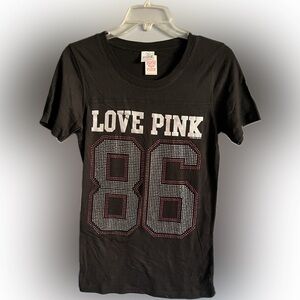 New PINK V-neck top with some sparkle on the front. Can’t beat this price!